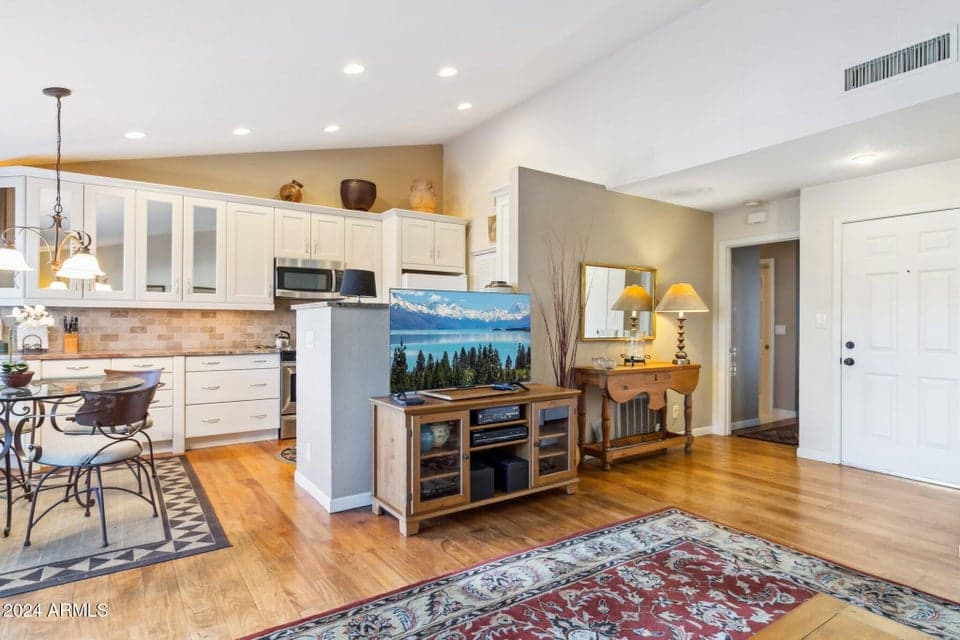 Wood floors, new carpet in bedroom