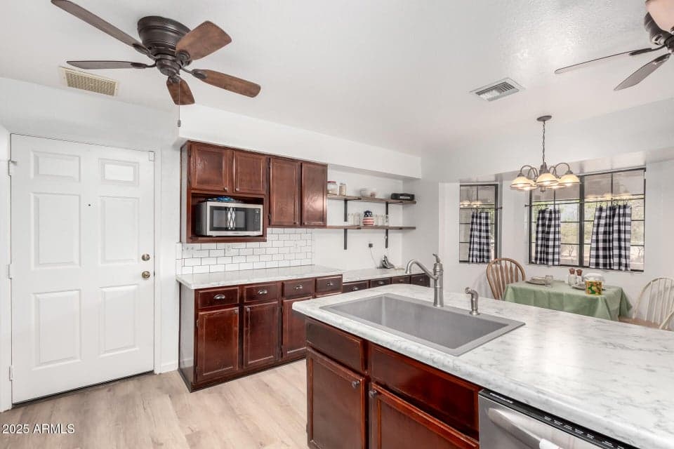 7117 N SARIVAL Avenue, Litchfield Park, AZ 85340 — photo 1 of 64
