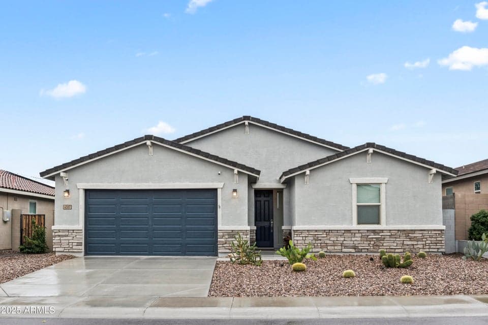 Front elevation with 3 car garage
