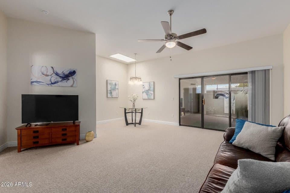 10943 W COGGINS Drive, Sun City, AZ 85351 — photo 1 of 36