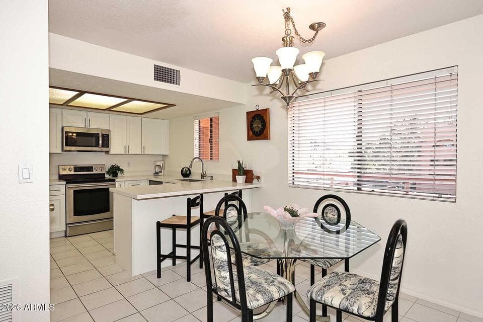 12212 N PARADISE VILLAGE Parkway S 302, Phoenix, AZ 85032 — photo 1 of 52