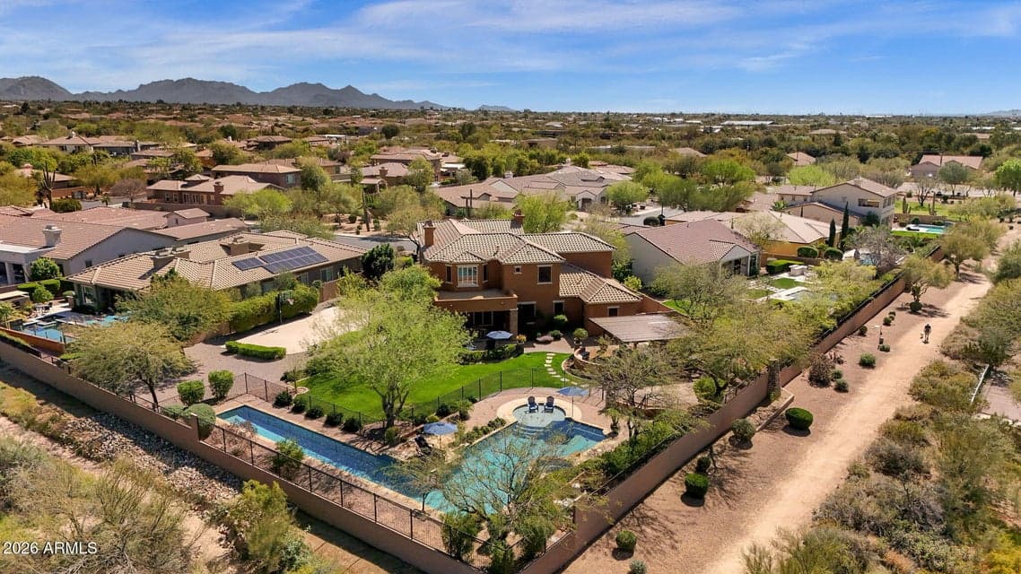 This premiere lot with a resort style backyard situated on a half acre lot within the gated Montevista.