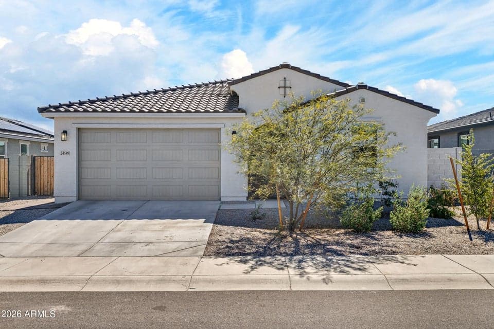 Charming single-story home in Buckeye with clean curb appeal, desert landscaping, and a 2-car garage. Built in 2023, this property offers modern design and energy-efficient construction.