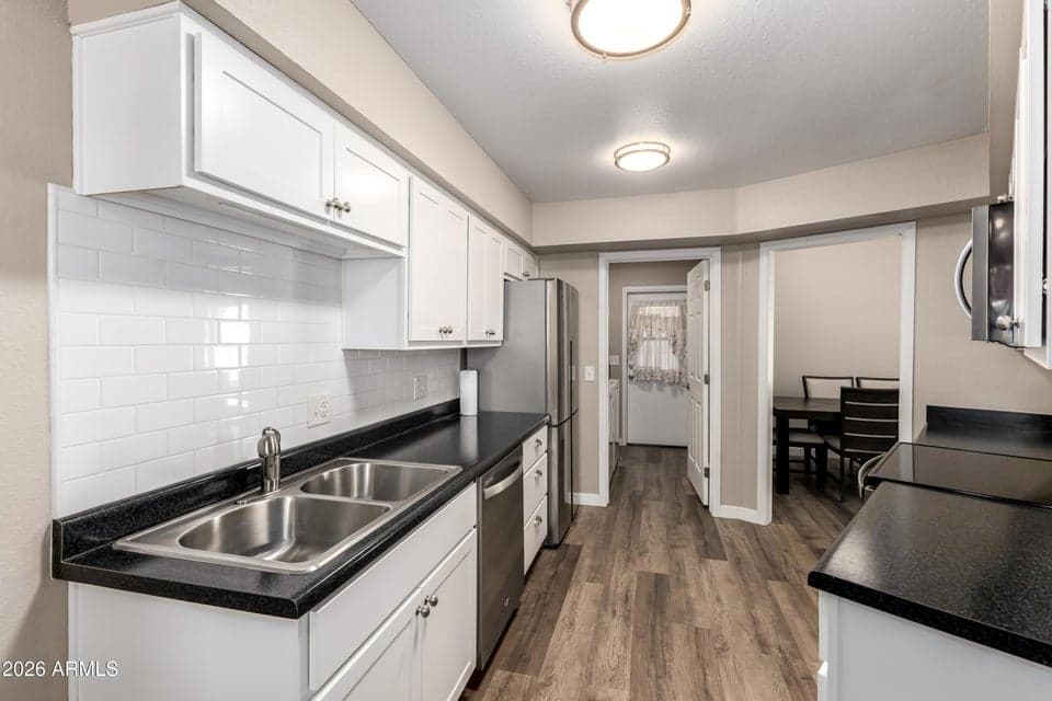 10921 W COGGINS Drive, Sun City, AZ 85351 — photo 1 of 16