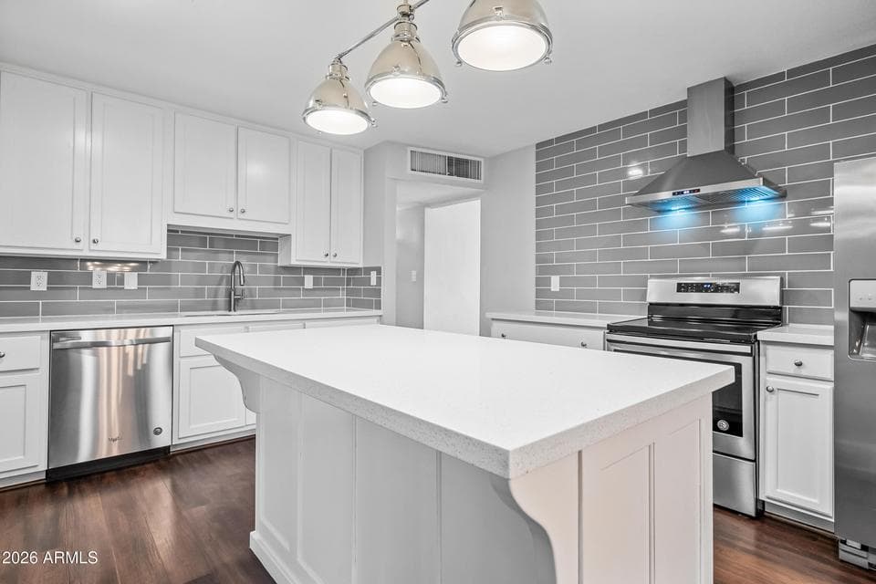 Quartz countertops and stainless steel appliances