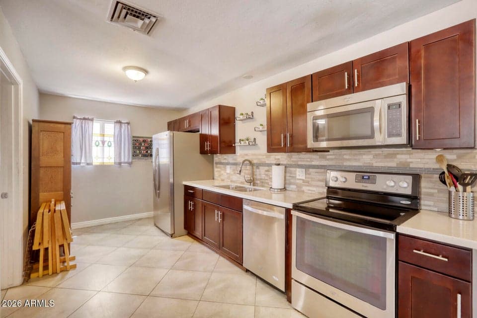 1220 S GRAND Drive, Apache Junction, AZ 85120 — photo 1 of 28