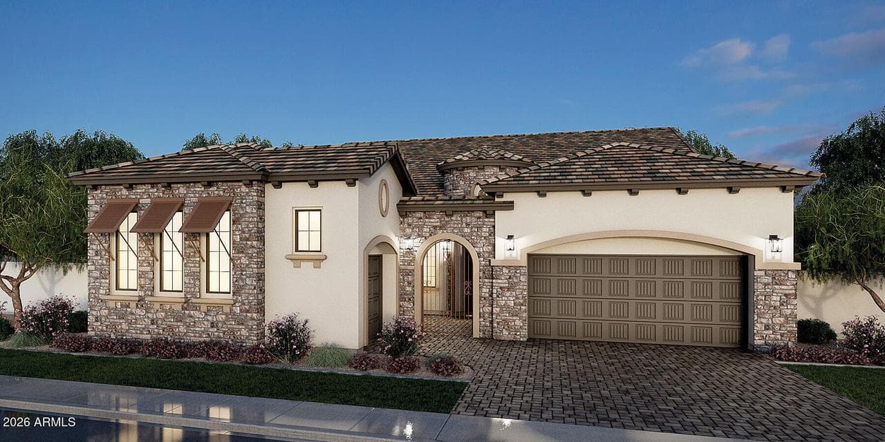 Vintage Elevation with white glacier brick on the outside and slate grey pavers.