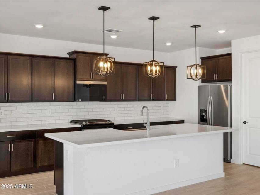 Photo is not of the actual home. Interior finishes and fixtures may vary.