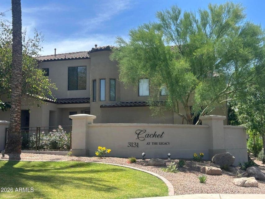 WELCOME TO CACHET! CONDO OVERLOOKS PALM TREE LINED ENTRANCE.