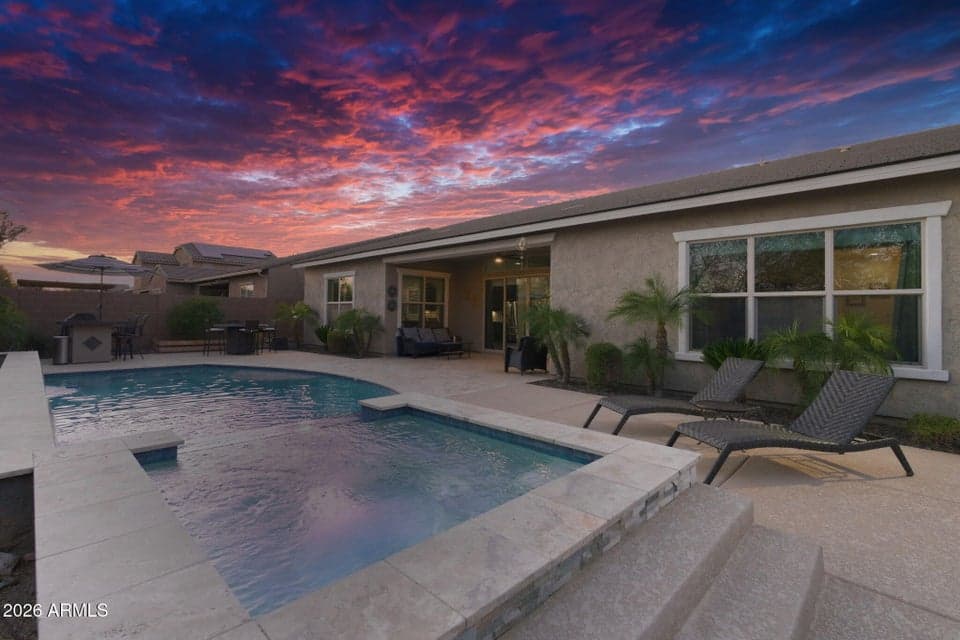Gorgeous backyard complete with your own private pool, spa, built in Barbecue, large covered patio, and beautiful travertine!