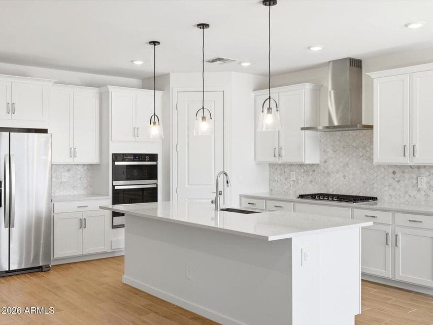 Photo is not of the actual home. Interior finishes and fixtures may vary.