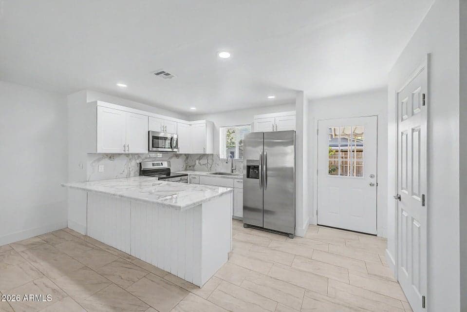 3253 W PORT AU PRINCE Lane, Phoenix, AZ 85053 — photo 1 of 26