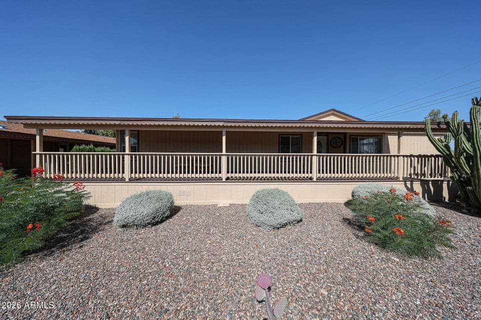 Very large composite front deck on corner lot
