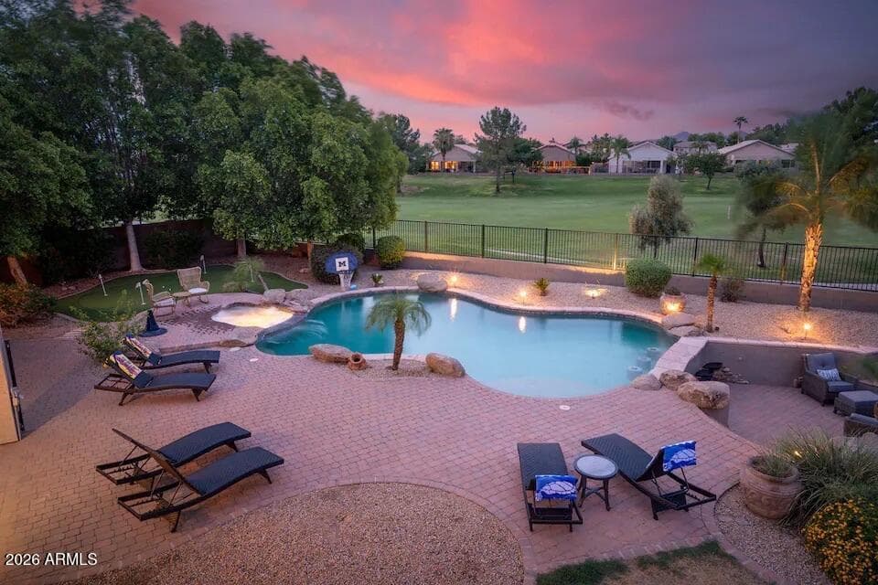 Upper level views over pool and golf course.