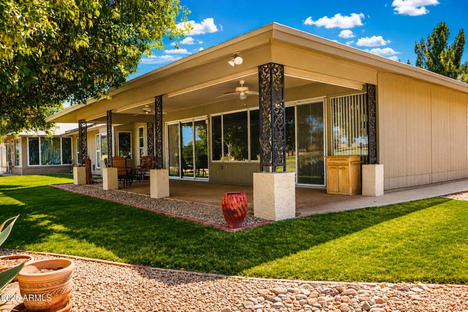 An inviting back patio for golf course and sunset views!