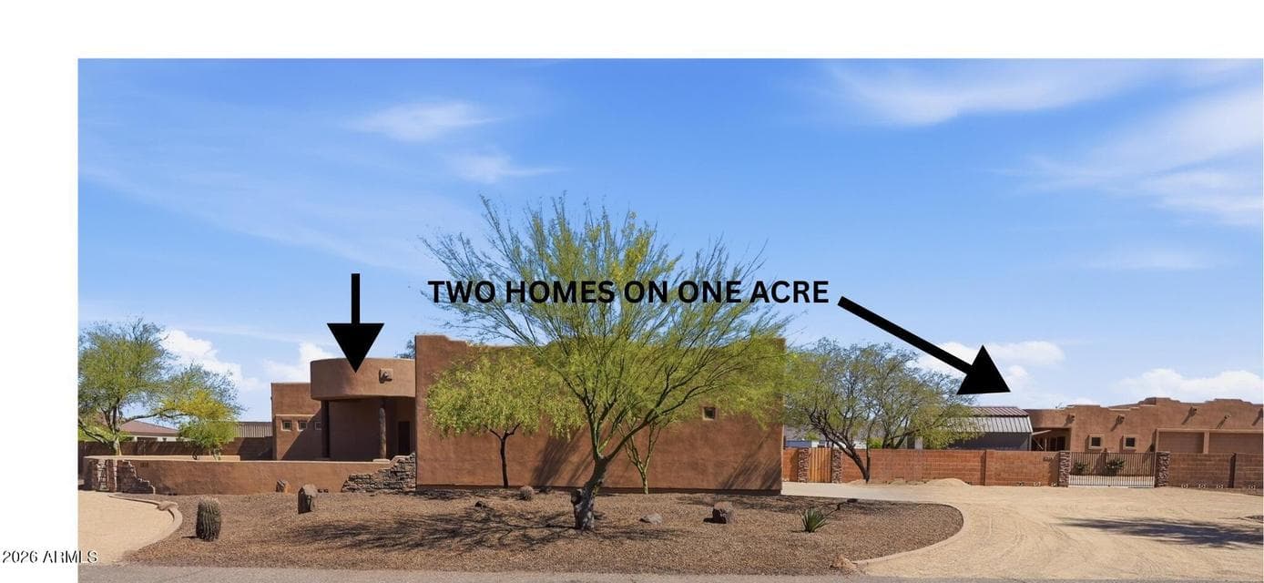 Two spacious homes on one acre. Main home is 2800 sq ft, 1 bedroom casita with full kitchen is 894 sq ft.
