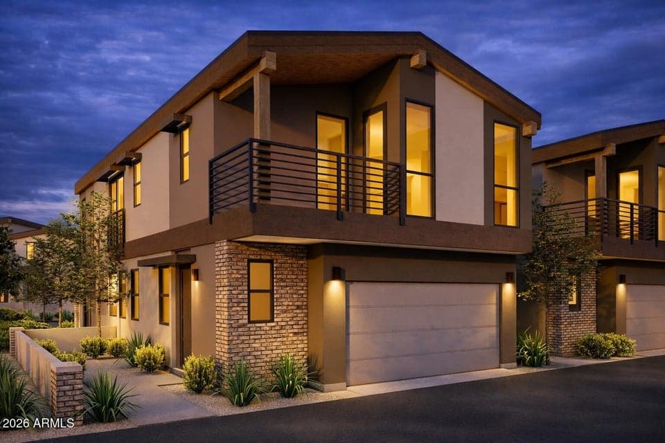 Architecturally distinctive detached residence featuring mid-century modern design, clean rooflines, private two-car garage, and lock-and-leave luxury living in the heart of Scottsdale.