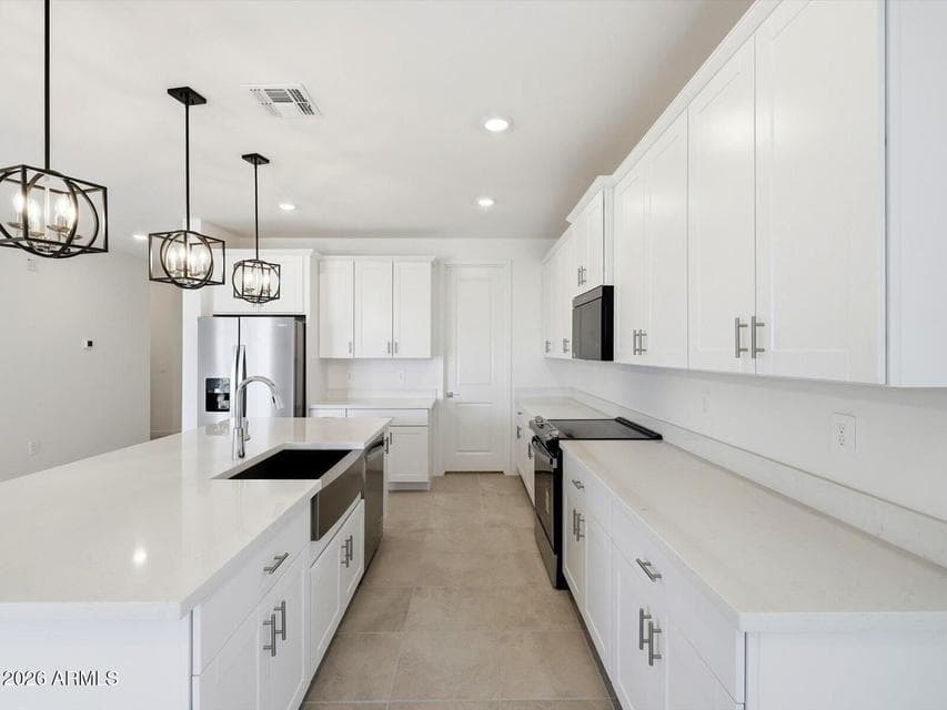 Photo is not of the actual home. Interior finishes and fixtures may vary.