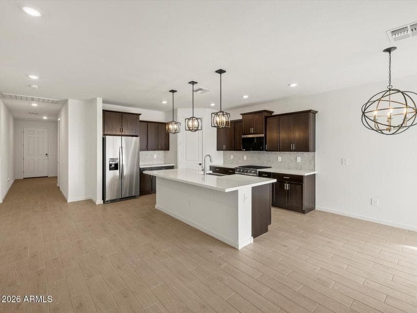 Photo is not of the actual home. Interior finishes and fixtures may vary.