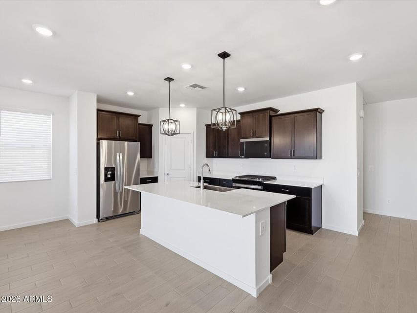 Photo is not of the actual home. Interior finishes and fixtures may vary.