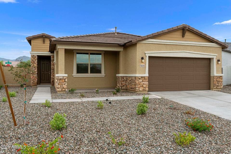 FRONT OF HOME ON A CORNER LOT