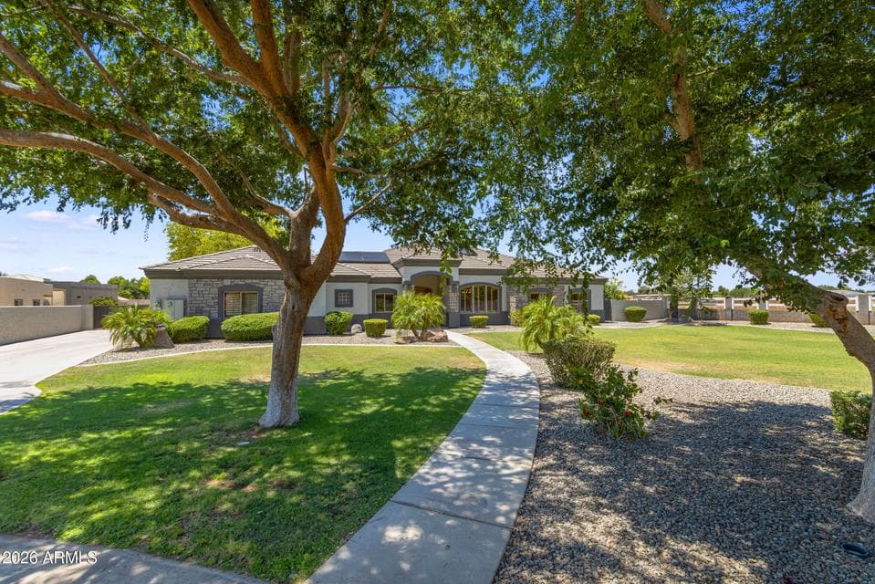 Nestled on a secluded cul-de-sac lot of nearly an acre