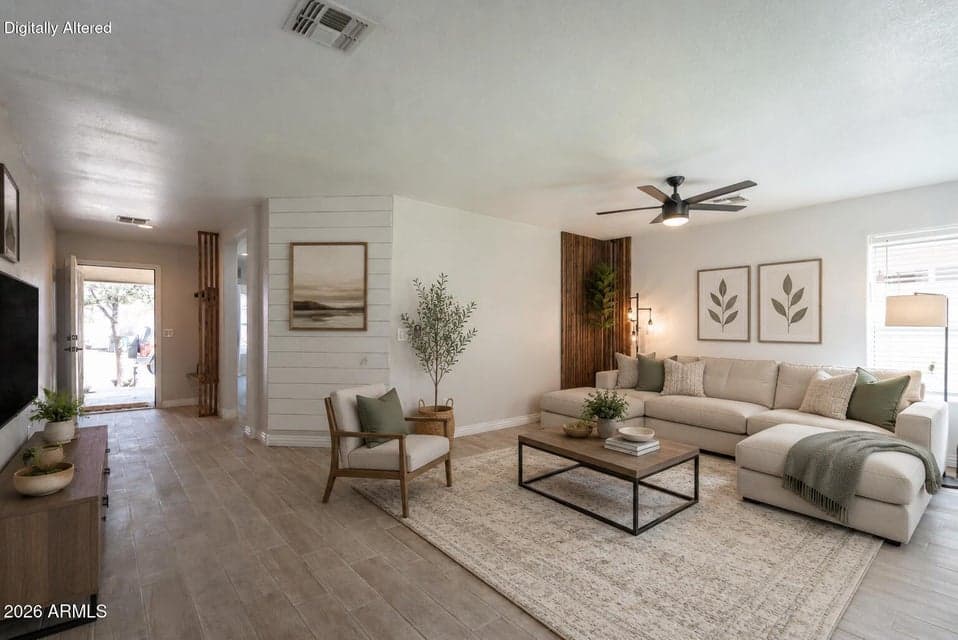 Spacious room to gather and laugh together. Virtually staged.