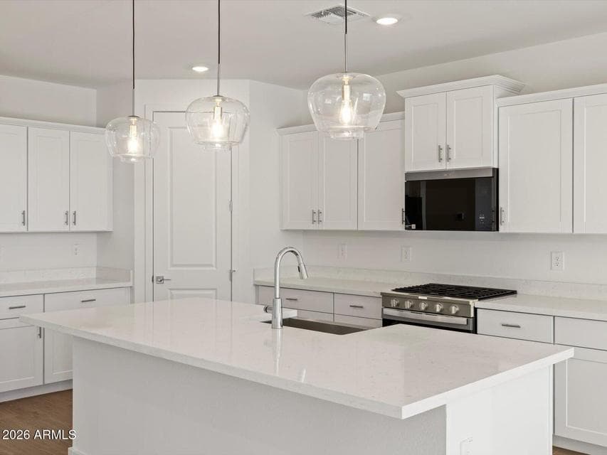 Photo is not of the actual home. Interior finishes and fixtures may vary.
