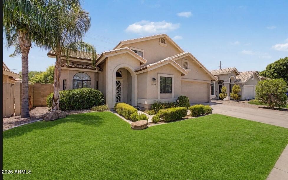 A verdant lawn and trees for shade welcome you HOME.
