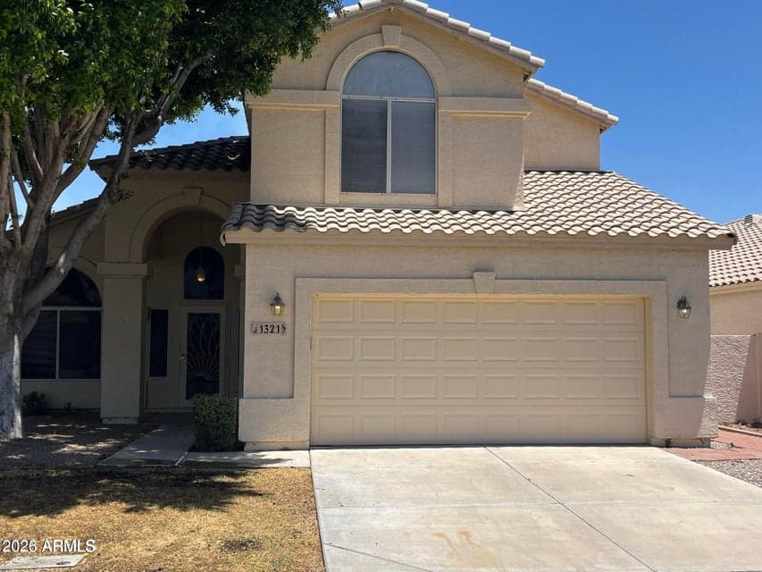 Welcome home to this beautifully maintained two-story rental featuring timeless curb appeal, a covered entry, a 2-car garage, and mature landscaping in the highly desirable Val Vista Lakes community in Gilbert.