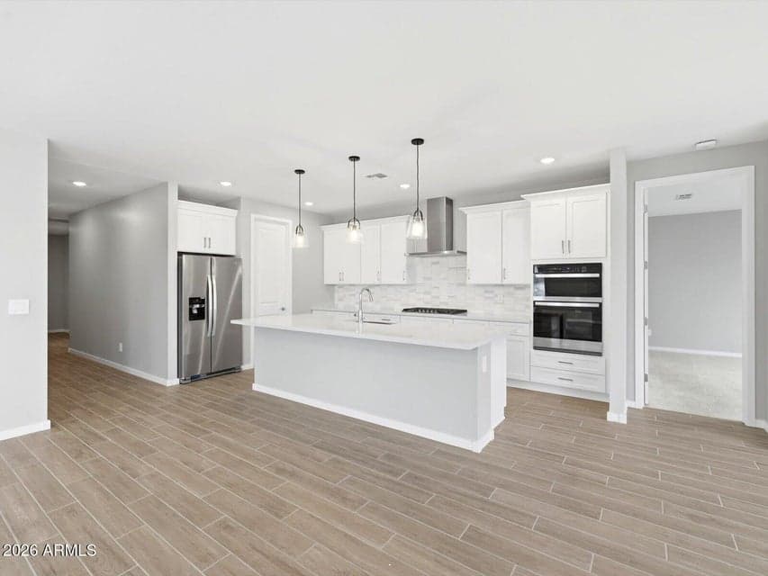 Photo is not of the actual home. Interior finishes and fixtures may vary.
