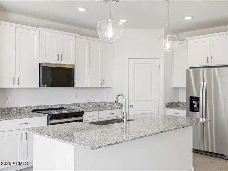 Photo is not of the actual home. Interior finishes and fixtures may vary.