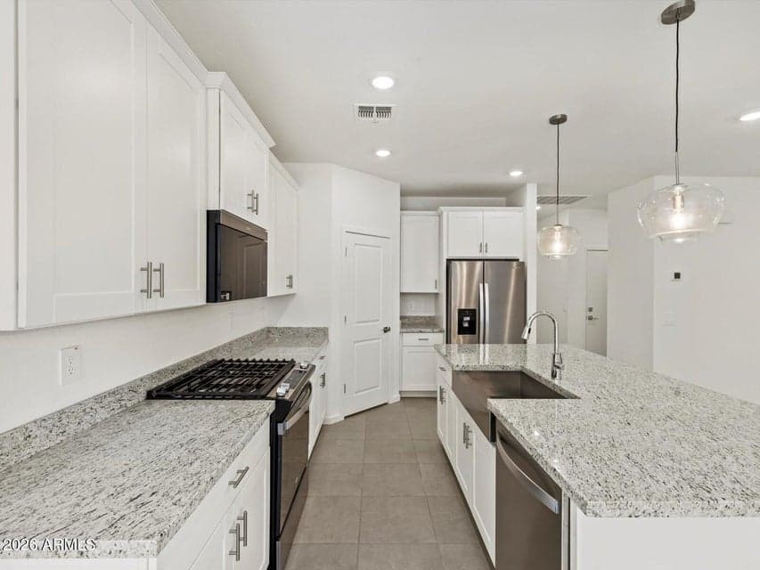 Photo is not of the actual home. Interior finishes and fixtures may vary.