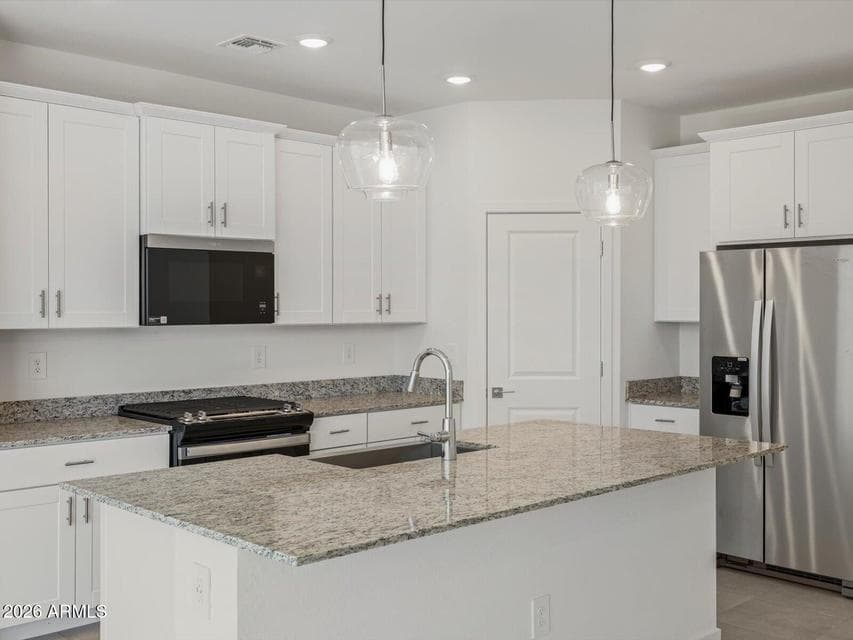 Photo is not of the actual home. Interior finishes and fixtures may vary.