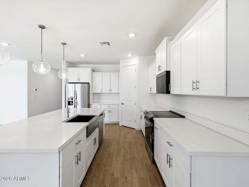 Photo is not of the actual home. Interior finishes and fixtures may vary.