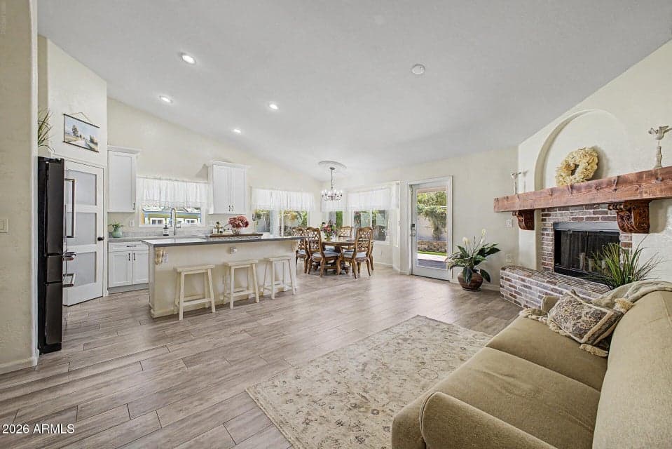 The open concept great room encompasses the kitchen, family room and dining room.