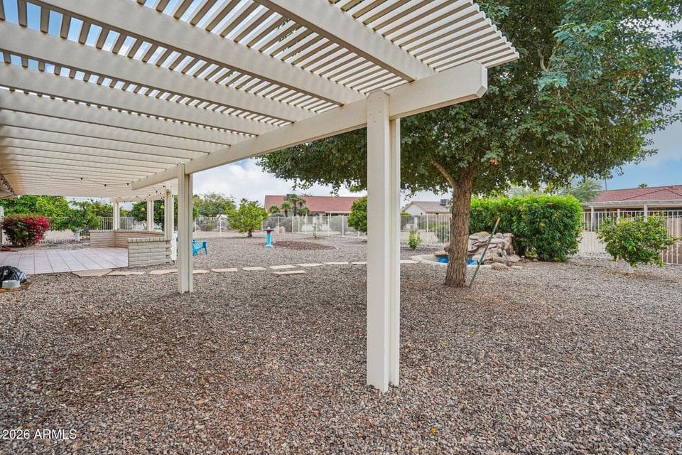 Back yard showing extra long Pergola & Mature landscaping