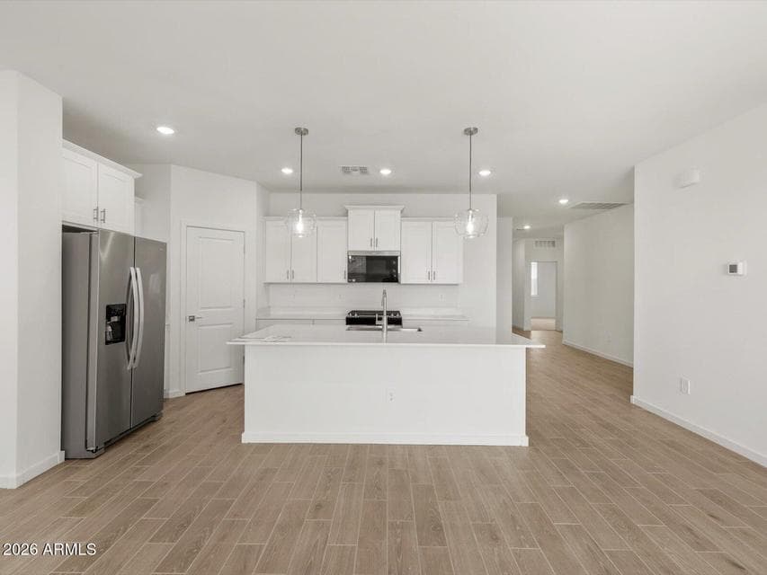 Photo is not of the actual home. Interior finishes and fixtures may vary.