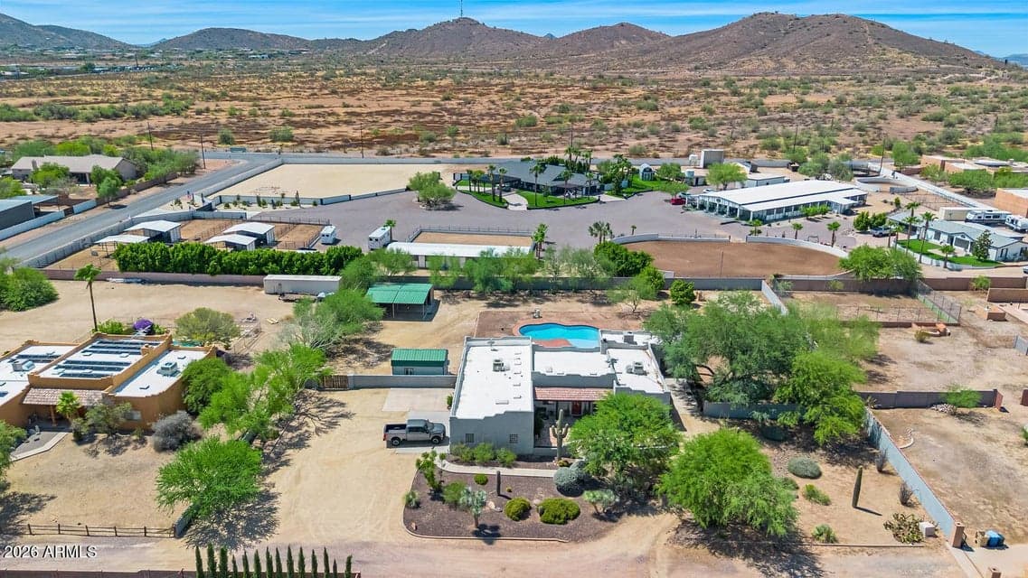 Look at this sprawling compound on a flat lot in the heart of Desert Hills