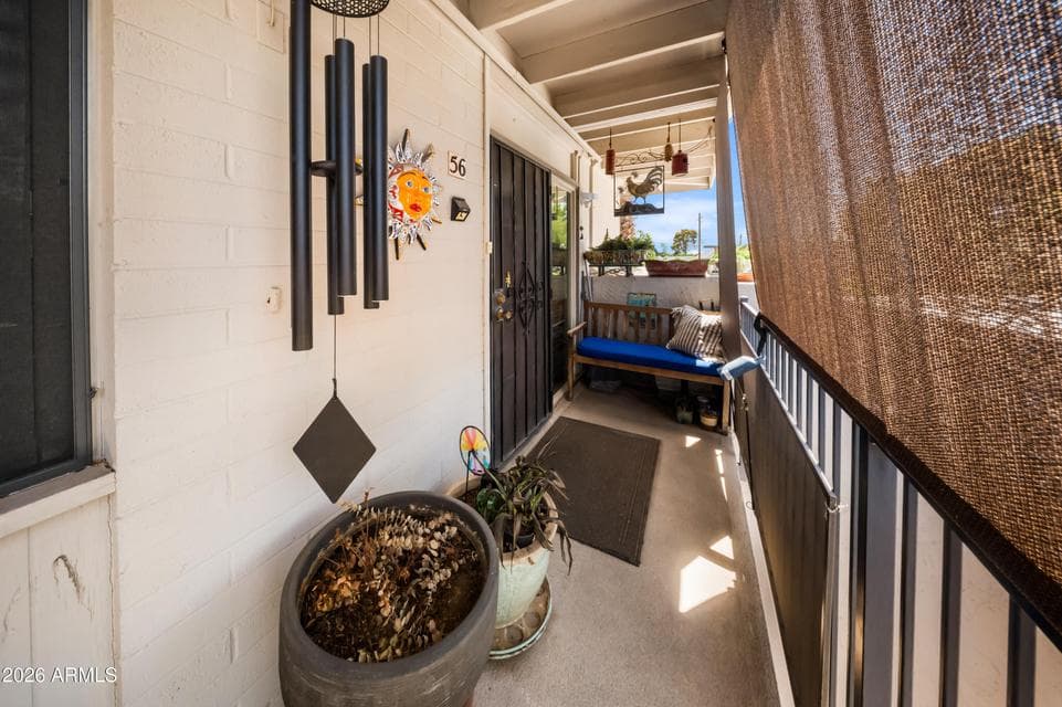 Upstairs end unit in Camelback Castille, offering added privacy within an established Arcadia-area community.