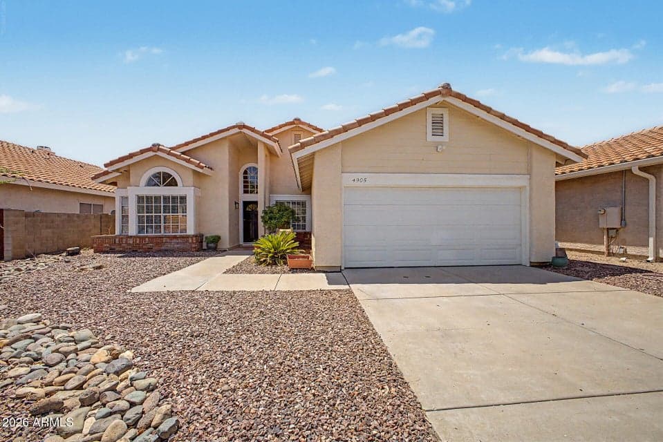 Welcome home to this beautifully maintained Scottsdale residence featuring timeless architecture, a two-car garage, mature desert landscaping, and an inviting front entry. This move-in-ready home offers exceptional curb appeal in a desirable Scottsdale neighborhood close to shopping, dining, and everyday conveniences.