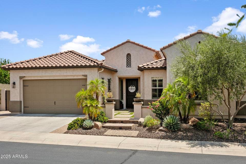 Elegant Taylor Morrison Home; the very popular "Stowe" Model with extended length 3-Car Tandem Garage and a Resort Backyard designed for entertaining! Located on a Private Cul-de-sac Street; very close to the 10 acre park with playground and on site bathrooms