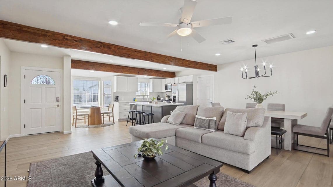 Great room opens to the kitchen and dining