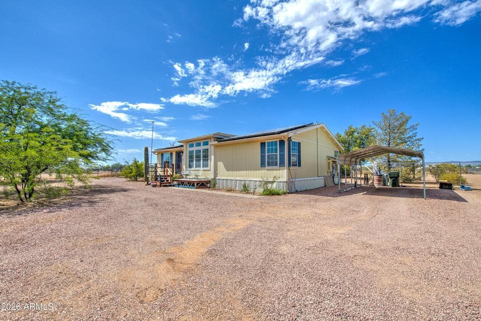 22148 W GAMBIT Trail, Wittmann, AZ 85361 — photo 1 of 41