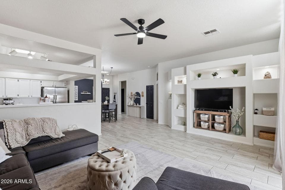 Welcome home to this beautifully remodeled, move-in ready single-level townhome in one of East Mesa’s most desirable areas near Red Mountain!
