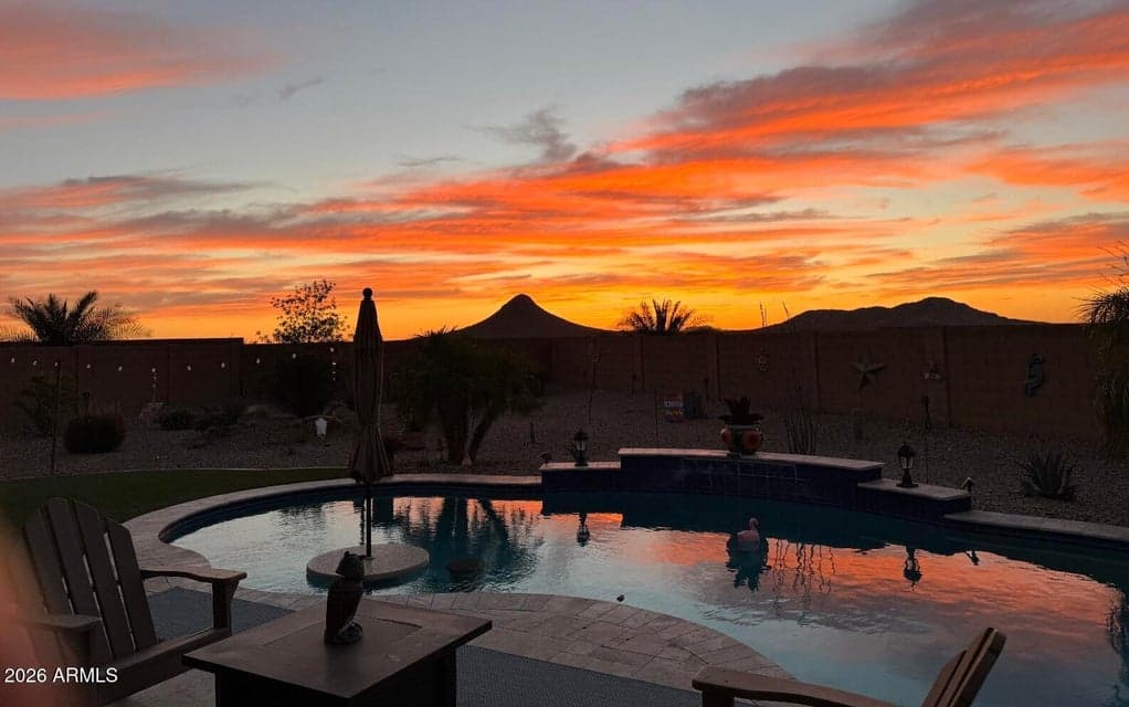 Welcome to one of the largest lots in anthem with AMAZING views. This is an actual pic taken by the current owner! Every night is a beautiful landscape!