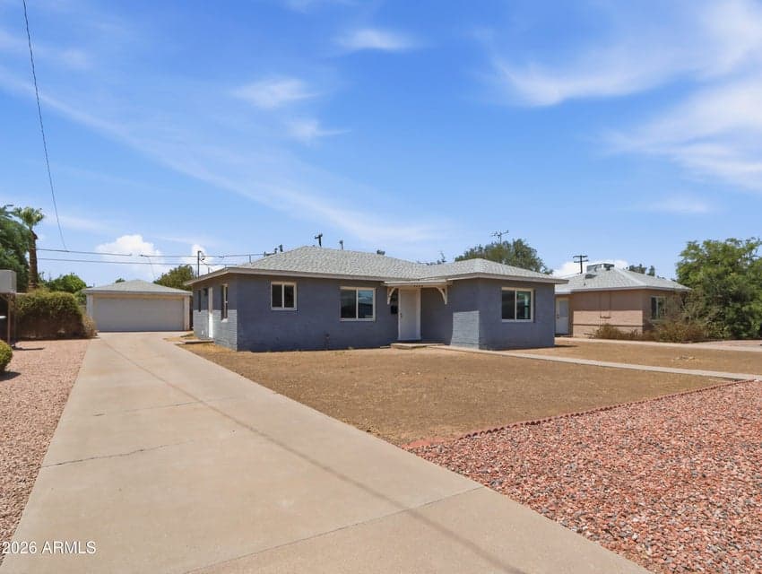 Welcome to Encanto Terrace! Adorable 1947 home with 2 car garage.