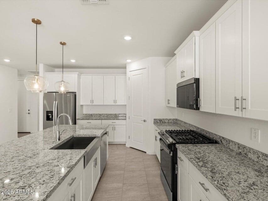 Photo is not of the actual home. Interior finishes and fixtures may vary.