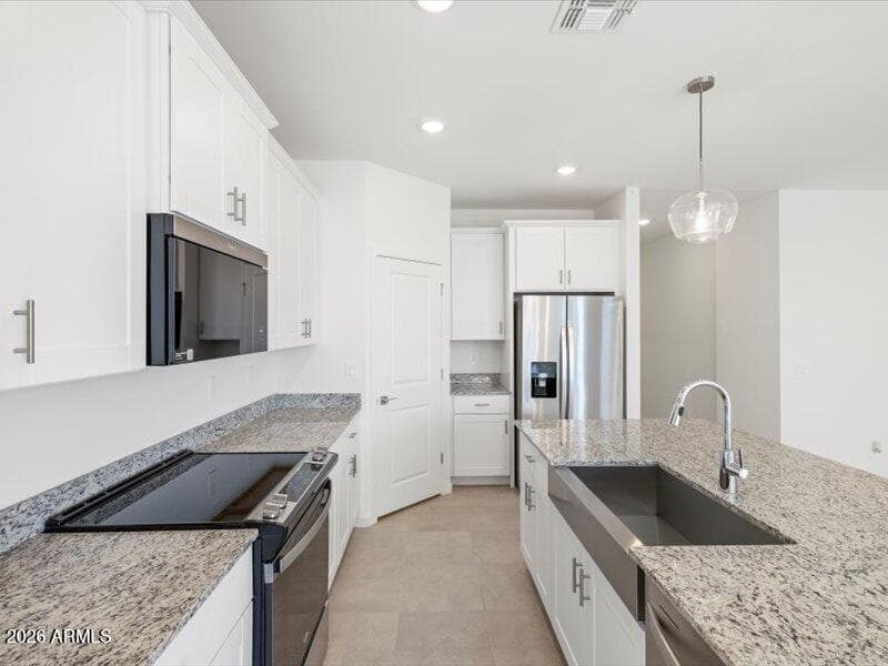 Photo is not of the actual home. Interior finishes and fixtures may vary.