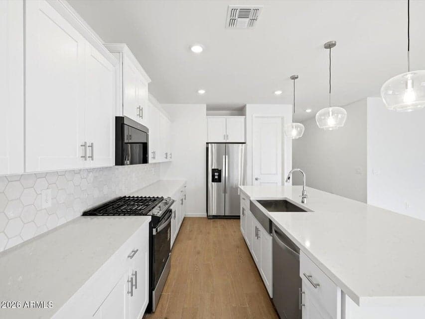 Photo is not of the actual home. Interior finishes and fixtures may vary.